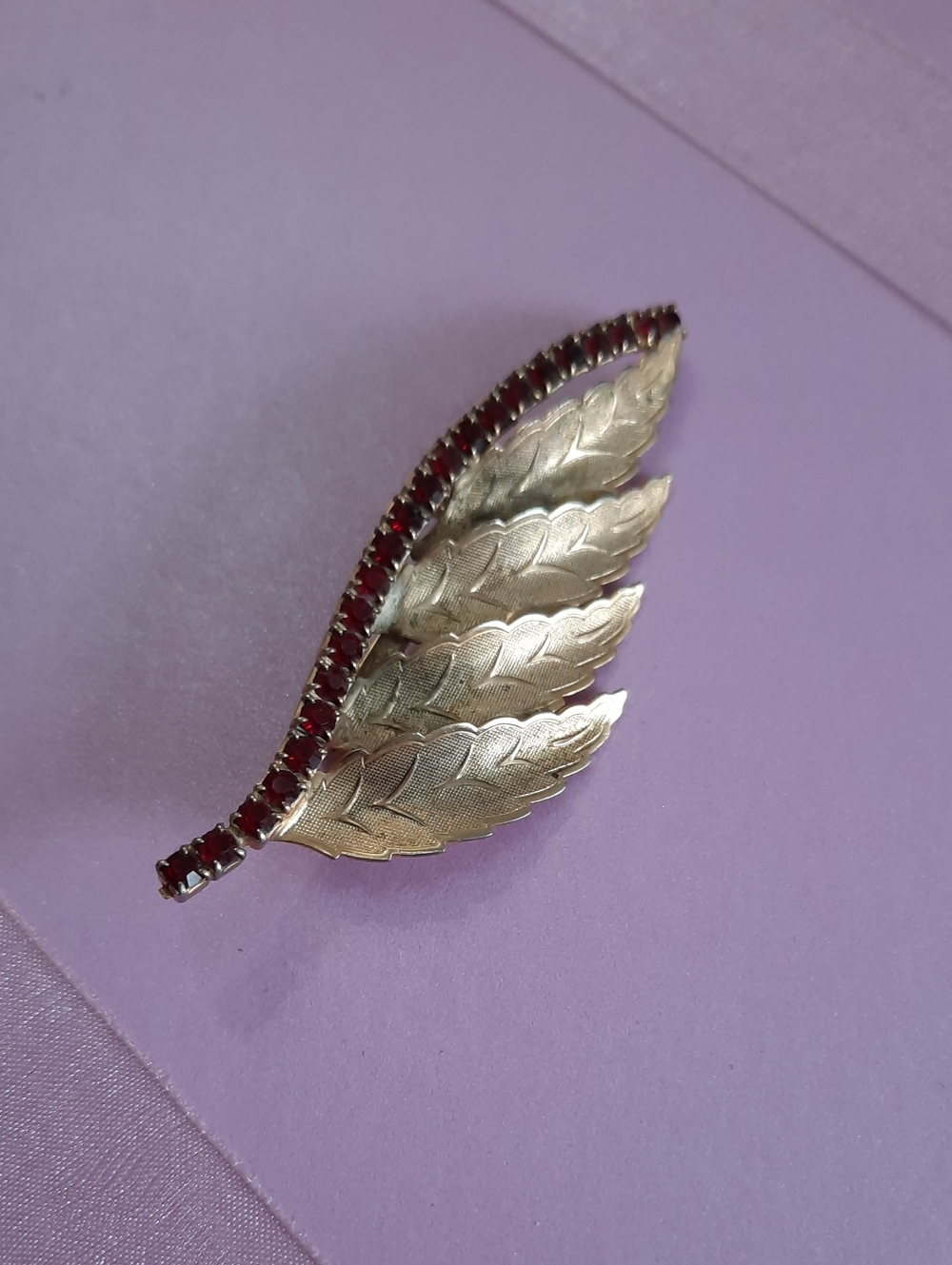 Gold-tone Leaf Pin Brooch with Red Stone Accents